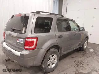 2008 Ford Escape Hybrid with VIN 1FMCU59H18KC30939, listed as a IAAI auction lot 41575587 with 208,879 mi miles. Bid and sale history available at carsss.com. Image 4.