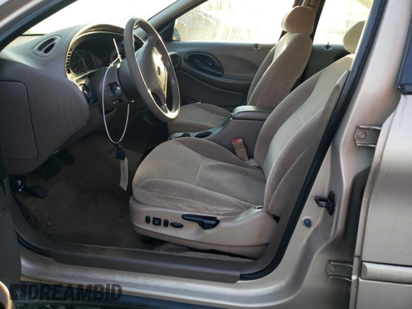 1999 Ford Taurus SE z VIN 1FAFP53U9XG107489, wystawiony jako Copart lot #69576093 z przebiegiem 86 262 mil mil oraz Szkody całkowita. Historia ofert i sprzedaży dostępna na DreamBid. Obrazek 7.