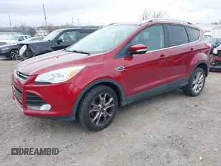2016 Ford Escape Titanium with VIN 1FMCU9J92GUB13000, listed as a IAAI auction lot 41725258 with 66,817 mi miles. Bid and sale history available at carsss.com. Image 16.