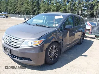 2012 Honda Odyssey EX-L with VIN 5FNRL5H64CB127523, listed as a IAAI auction lot 39818448 with 102,514 mi miles and . Bid and sale history available at DreamBid. Image 2.