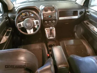 2017 Jeep Compass Latitude with VIN 1C4NJDEB7HD106048, listed as a Copart auction lot 56716925 with 208,777 mi miles and Salvage title. Bid and sale history available at DreamBid. Image 8.
