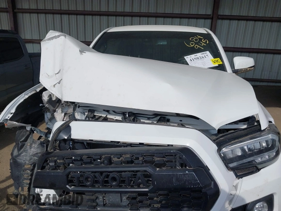 2021 Toyota Tacoma SR z VIN 3TMCZ5AN4MM373247, wystawiony jako IAAI lot #41982617 z przebiegiem 45 692 mil mil oraz . Historia ofert i sprzedaży dostępna na DreamBid. Obrazek 10.