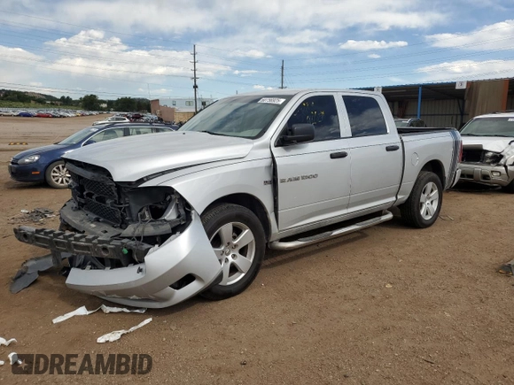 2012 Ram 1500 Express with VIN 1C6RD7KT1CS142370, listed as a Copart auction lot 60756925 with 106,627 mi miles and Salvage title. Bid and sale history available at DreamBid. Image 1.