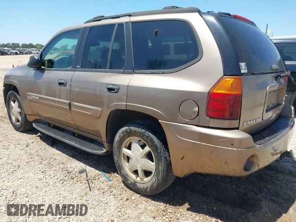 2003 GMC Envoy SLT with VIN 1GKDS13S432246741, listed as a IAAI auction lot 42051902 with 344,691 mi miles and . Bid and sale history available at DreamBid. Image 3.
