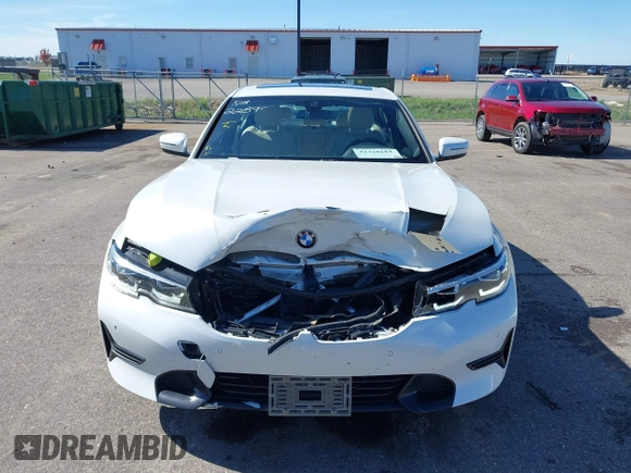 2021 BMW 3 Series 330i xDrive with VIN WBA5R7C0XMFK54525, listed as a IAAI auction lot 42320181 with 54,576 mi miles and . Bid and sale history available at DreamBid. Image 12.