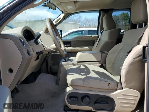 2007 Ford F-150 STX with VIN 1FTRX14W57FB39989, listed as a Copart auction lot 50695635 with 252,852 mi miles and Salvage title. Bid and sale history available at DreamBid. Image 7.