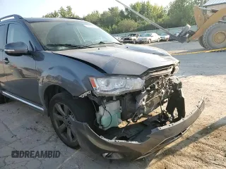 2010 Mitsubishi Outlander XLS z VIN JA4JS4AX2AZ014751, wystawiony jako Copart lot #72210974 z przebiegiem 183 864 mil mil oraz Szkoda całkowita • Salvage title. Historia ofert i sprzedaży dostępna na DreamBid. Obrazek 10.