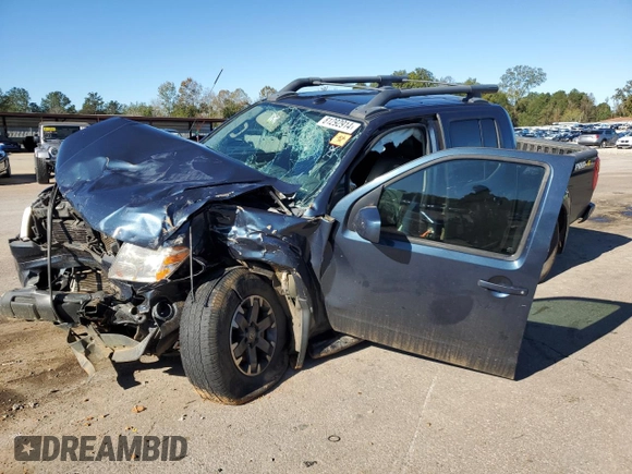 2016 Nissan Frontier Pro-4X z VIN 1N6AD0EV6GN799371, wystawiony jako Copart lot #81292914 z przebiegiem Nie podano mil oraz Szkoda całkowita • Salvage title. Historia ofert i sprzedaży dostępna na DreamBid. Obrazek 1.