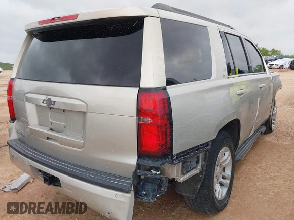 2015 Chevrolet Tahoe LS with VIN 1GNSCAKC9FR294832, listed as a IAAI auction lot 39274877 with 126,932 mi miles and . Bid and sale history available at DreamBid. Image 16.