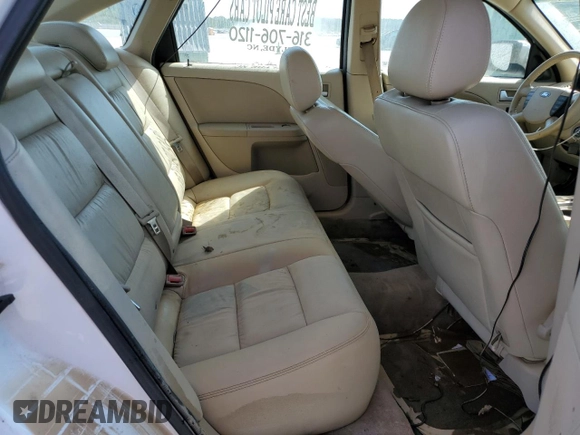 2005 Ford Five Hundred Limited with VIN 1FAFP28135G201703, listed as a Copart auction lot 74421714 with 114,247 mi miles and Salvage Title. Bid and sale history available at carsss.com. Image 10.