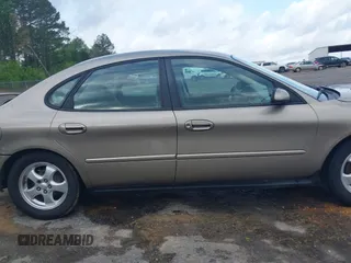 2003 Ford Taurus SE Standard with VIN 1FAFP53U63G125751, listed as a IAAI auction lot 41933803 with 196,710 mi miles. Bid and sale history available at carsss.com. Image 14.