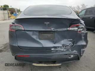 2022 Tesla Model Y Performance z VIN 7SAYGDEF1NF457494, wystawiony jako Copart lot #43287315 z przebiegiem 79 855 mil mil oraz Szkoda całkowita • Salvage title. Historia ofert i sprzedaży dostępna na DreamBid. Obrazek 6.