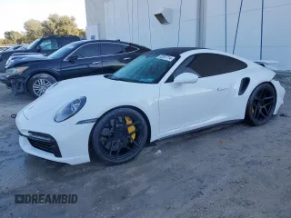 2021 Porsche 911 Turbo S with VIN WP0AD2A98MS257662, listed as a Copart auction lot 83297714 with 72,267 mi miles and Salvage Title. Bid and sale history available at carsss.com. Image 1.