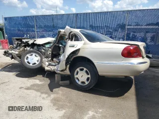 2000 Lincoln Continental with VIN 1LNHM97V5YY785721, listed as a Copart auction lot 57934824 with 0 mi miles and Non Repairable. Bid and sale history available at carsss.com. Image 2.