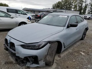 2023 BMW i4 M50 z VIN WBY33AW02PFP88948, wystawiony jako Copart lot #67563423 z przebiegiem 2 090 mil mil oraz . Historia ofert i sprzedaży dostępna na DreamBid. Obrazek 1.