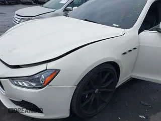 2014 Maserati Ghibli S Q4 with VIN ZAM57RTA3E1090350, listed as a IAAI auction lot 42056682 with 119,160 mi miles and . Bid and sale history available at DreamBid. Image 12.