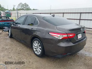 2020 Toyota Camry LE with VIN 4T1C11AK1LU320677, listed as a IAAI auction lot 41914421 with 94,291 mi miles. Bid and sale history available at carsss.com. Image 3.