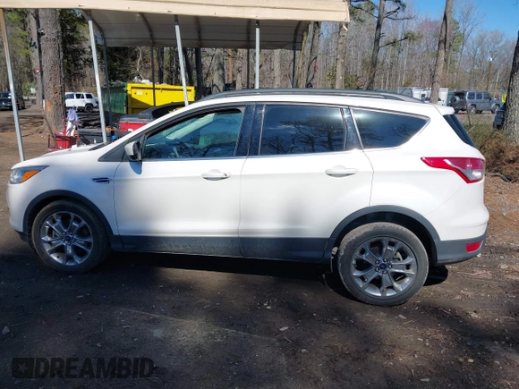 2016 Ford Escape SE with VIN 1FMCU0G9XGUB90670, listed as a IAAI auction lot 41694382 with 167,631 mi miles. Bid and sale history available at carsss.com. Image 14.