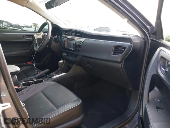 2016 Toyota Corolla L with VIN 5YFBURHE8GP561600, listed as a IAAI auction lot 41389830 with 129,897 mi miles and . Bid and sale history available at DreamBid. Image 5.