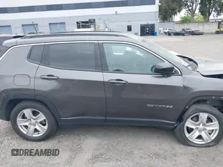 2022 Jeep Compass Latitude with VIN 3C4NJCBB8NT188411, listed as a IAAI auction lot 42011145 with 14,629 mi miles and . Bid and sale history available at DreamBid. Image 14.