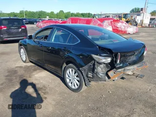 2012 Mazda 6 i Touring with VIN 1YVHZ8DH2C5M23669, listed as a IAAI auction lot 42247758 with 123,389 mi miles and . Bid and sale history available at DreamBid. Image 6.
