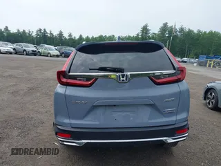 2021 Honda CR-V Touring with VIN 7FART6H91ME022993, listed as a IAAI auction lot 42439344 with 30,477 mi miles and . Bid and sale history available at DreamBid. Image 17.