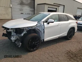 2022 Lexus RX with VIN JTJHZKFA7N2042470, listed as a Copart auction lot 69013244 with 13,974 mi miles and Salvage Title. Bid and sale history available at carsss.com. Image 1.