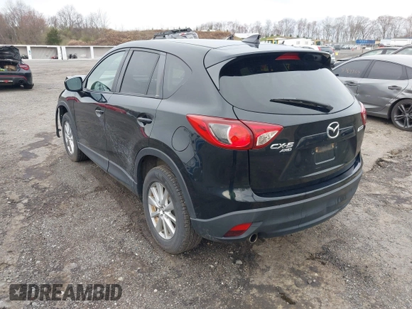 2016 Mazda CX-5 Touring with VIN JM3KE4CY4G0738713, listed as a IAAI auction lot 41998597 with 146,595 mi miles and . Bid and sale history available at carsss.com. Image 3.