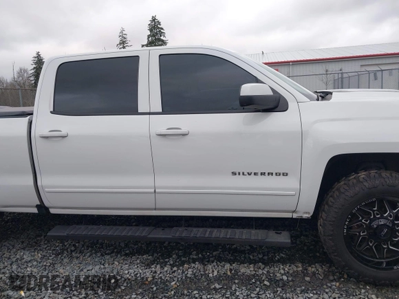 2017 Chevrolet Silverado 1500 LT with VIN 1GCUKREC1HF135337, listed as a IAAI auction lot 41267713 with 114,417 mi miles and . Bid and sale history available at DreamBid. Image 13.