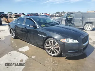 2015 Jaguar XJ with VIN SAJWA3HT8FMV90846, listed as a Copart auction lot 67423804 with 144,516 mi miles and Clean Title. Bid and sale history available at DreamBid. Image 4.
