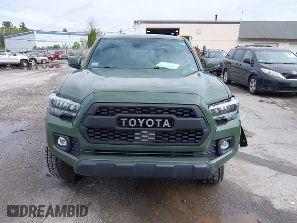 2021 Toyota Tacoma SR with VIN 3TMCZ5AN5MM380286, listed as a IAAI auction lot 42165523 with 58,965 mi miles and . Bid and sale history available at DreamBid. Image 12.