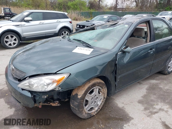 2002 Toyota Camry XLE z VIN 4T1BF32K02U522335, wystawiony jako IAAI lot #42037459 z przebiegiem 214 832 mil mil oraz . Historia ofert i sprzedaży dostępna na DreamBid. Obrazek 16.