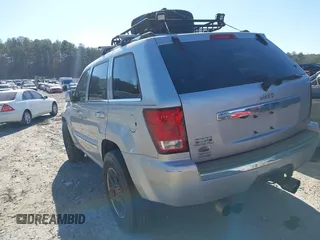 2009 Jeep Grand Cherokee with VIN 1J8HR68T39C540795, listed as a IAAI auction lot 41379112 with 236,624 mi miles and . Bid and sale history available at DreamBid. Image 3.