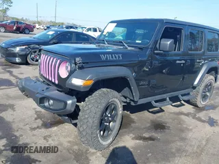 2021 Jeep Wrangler Unlimited Sport S with VIN 1C4HJXDN6MW812565, listed as a IAAI auction lot 41506140 with 27,273 mi miles and . Bid and sale history available at DreamBid. Image 2.