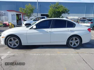 2015 BMW 3 Series 328i with VIN WBA3C1C52FK119339, listed as a IAAI auction lot 41549876 with 148,347 mi miles and . Bid and sale history available at carsss.com. Image 14.