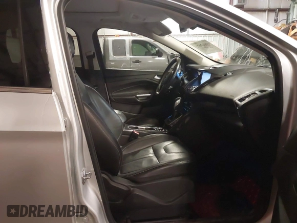 2013 Ford Escape Titanium z VIN 1FMCU0J94DUA93128, wystawiony jako IAAI lot #41612072 z przebiegiem 174 274 mil mil oraz . Historia ofert i sprzedaży dostępna na DreamBid. Obrazek 5.