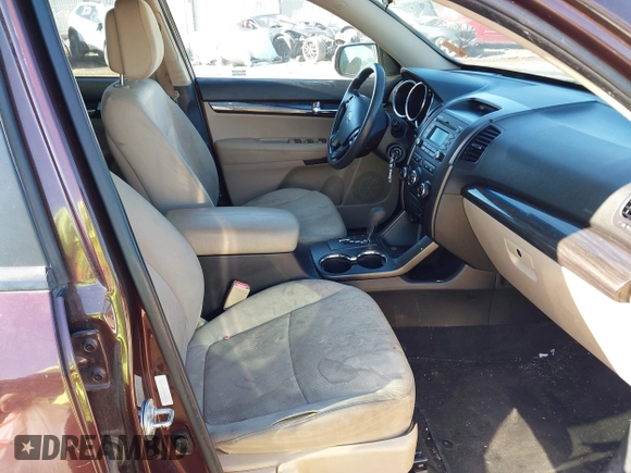 2013 Kia Sorento LX with VIN 5XYKT3A17DG375103, listed as a IAAI auction lot 42327291 with 228,761 mi miles and . Bid and sale history available at DreamBid. Image 5.