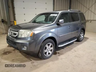 2011 Honda Pilot Touring z VIN 5FNYF4H94BB071119, wystawiony jako Copart lot #56093875 z przebiegiem 158 830 mil mil oraz Czysty tytuł • Clean title. Historia ofert i sprzedaży dostępna na DreamBid. Obrazek 1.