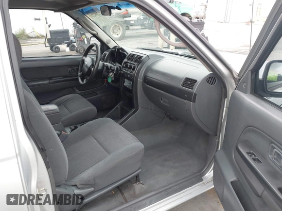 2004 Nissan Frontier XE with VIN 1N6DD26T44C426195, listed as a IAAI auction lot 42208220 with 266,590 mi miles and . Bid and sale history available at DreamBid. Image 5.