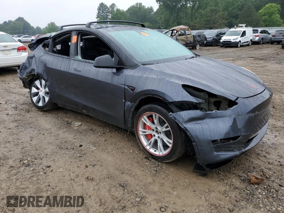 2023 Tesla Model Y Long Range z VIN 7SAYGDEE7PF870370, wystawiony jako Copart lot #55700135 z przebiegiem 32 410 mil mil oraz Szkoda całkowita • Salvage title. Historia ofert i sprzedaży dostępna na DreamBid. Obrazek 4.