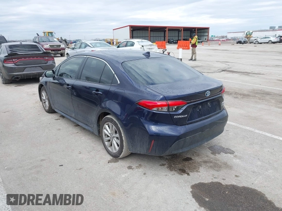 2023 Toyota Corolla Hybrid LE with VIN JTDBCMFE7PJ001872, listed as a IAAI auction lot 41529174 with 13,838 mi miles. Bid and sale history available at carsss.com. Image 3.