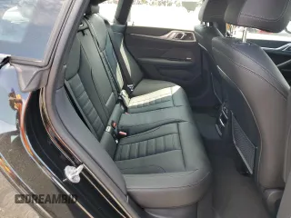 2024 BMW i4 M50 with VIN WBY33AW09RFS37404, listed as a Copart auction lot 51594984 with 776 mi miles and Salvage Title. Bid and sale history available at carsss.com. Image 10.