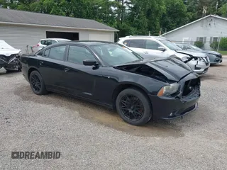 2013 Dodge Charger Police z VIN 2C3CDXAG1DH521921, wystawiony jako IAAI lot #42504902 z przebiegiem 121 627 mil mil oraz . Historia ofert i sprzedaży dostępna na DreamBid. Obrazek 1.