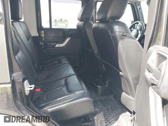 2015 Jeep Wrangler Unlimited Rubicon Hard Rock с VIN 1C4HJWFG0FL550247, выставлен на аукционе IAAI как лот 42474614 с пробегом 93 084 миль миль и . История ставок и продаж доступна на DreamBid. Изображение 8.