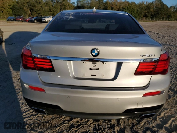 2015 BMW 7 Series 750i with VIN WBAYA8C53FGK19778, listed as a Copart auction lot 77258684 with 34,535 mi miles and Salvage title. Bid and sale history available at DreamBid. Image 6.