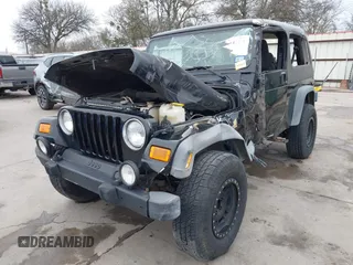 2004 Jeep Wrangler Sport with VIN 1J4FA49S64P794559, listed as a IAAI auction lot 41644201 with 107,445 mi miles. Bid and sale history available at carsss.com. Image 21.