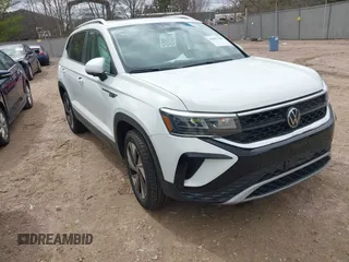 2023 Volkswagen Taos SE z VIN 3VVVX7B28PM360666, wystawiony jako IAAI lot #42087180 z przebiegiem 33 988 mil mil oraz . Historia ofert i sprzedaży dostępna na DreamBid. Obrazek 1.
