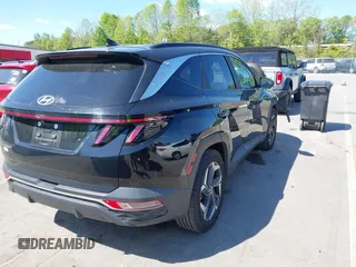 2022 Hyundai Tucson SEL z VIN 5NMJF3AE6NH018945, wystawiony jako IAAI lot #42050780 z przebiegiem 113 680 mil mil oraz . Historia ofert i sprzedaży dostępna na DreamBid. Obrazek 4.