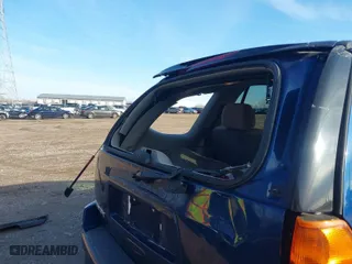 2004 GMC Envoy SLE with VIN 1GKDS13S842152119, listed as a IAAI auction lot 41187115 with 194,304 mi miles. Bid and sale history available at carsss.com. Image 14.