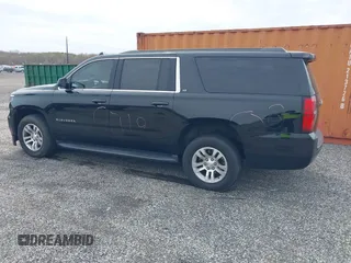 2019 Chevrolet Suburban LT with VIN 1GNSKHKC4KR405843, listed as a IAAI auction lot 41944385 with 123,071 mi miles and . Bid and sale history available at DreamBid. Image 13.